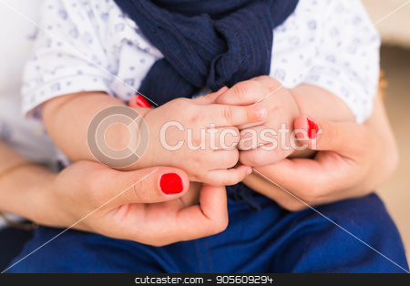 To use this stock image in your creative project, please select the size you need over to the right and click the "Add to Cart" button.
Your downloaded image will come with the Cutcaster watermark removed so don’t worry about the watermark you see on this page. Family Baby Hands. Mother Holding Newborn Kid. Child Hand Closeup into Parents stock photo, Family Baby Hands. Mother Holding Newborn Kid. Child Hand Closeup into Parents by Satura86