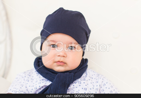 To use this stock image in your creative project, please select the size you need over to the right and click the "Add to Cart" button.
Your downloaded image will come with the Cutcaster watermark removed so don’t worry about the watermark you see on this page. portrait of happy little baby boy smiling stock photo, portrait of happy little baby boy smiling indoors by Satura86