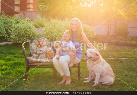 To use this stock image in your creative project, please select the size you need over to the right and click the "Add to Cart" button.
Your downloaded image will come with the Cutcaster watermark removed so don’t worry about the watermark you see on this page. Happy mother and two children with Golden Retriever dog in the garden stock photo, Happy mother and two children with Golden Retriever dog in the garden by Satura86