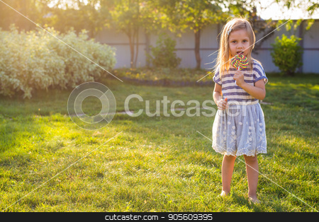 To use this stock image in your creative project, please select the size you need over to the right and click the "Add to Cart" button.
Your downloaded image will come with the Cutcaster watermark removed so don’t worry about the watermark you see on this page. Funny child with candy lollipop, happy little girl eating big sugar lollipop, kid eat sweets stock photo, Funny child with candy lollipop, happy little girl eating big sugar lollipop, kid eat sweets by Satura86