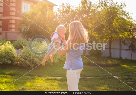 To use this stock image in your creative project, please select the size you need over to the right and click the "Add to Cart" button.
Your downloaded image will come with the Cutcaster watermark removed so don’t worry about the watermark you see on this page. happy harmonious family outdoors. mother laughing and playing with baby in the summer on the nature stock photo, happy harmonious family outdoors. mother laughing and playing with baby in the summer on the nature by Satura86