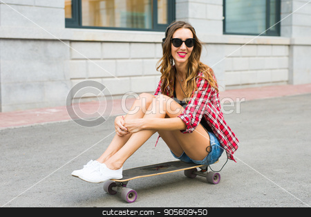 To use this stock image in your creative project, please select the size you need over to the right and click the "Add to Cart" button.
Your downloaded image will come with the Cutcaster watermark removed so don’t worry about the watermark you see on this page. Beautiful young woman in sunglasses seat on skate, street fashion lifestyle stock photo, Beautiful young woman in sunglasses seat on skate, street fashion lifestyle by Satura86