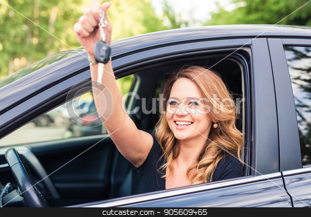 To use this stock image in your creative project, please select the size you need over to the right and click the "Add to Cart" button.
Your downloaded image will come with the Cutcaster watermark removed so don’t worry about the watermark you see on this page. Beautiful young woman driver showing car keys in hand stock photo, Beautiful young woman driver showing car keys in hand by Satura86