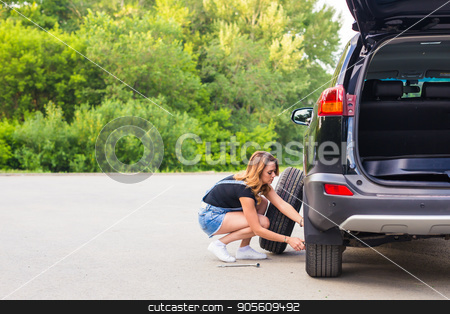 To use this stock image in your creative project, please select the size you need over to the right and click the "Add to Cart" button.
Your downloaded image will come with the Cutcaster watermark removed so don’t worry about the watermark you see on this page. Woman changes the wheel of car on a road stock photo, Woman changes the wheel of car on a road by Satura86