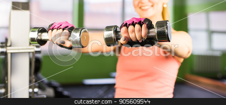 To use this stock image in your creative project, please select the size you need over to the right and click the "Add to Cart" button.
Your downloaded image will come with the Cutcaster watermark removed so don’t worry about the watermark you see on this page. Closeup on fitness woman workout with dumbbell stock photo, Closeup on fitness woman workout with dumbbell by Satura86