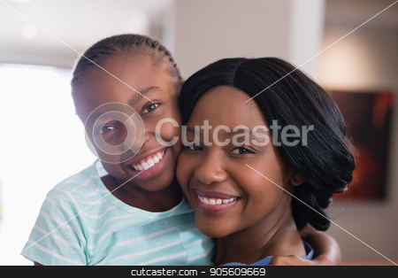 To use this stock image in your creative project, please select the size you need over to the right and click the "Add to Cart" button.
Your downloaded image will come with the Cutcaster watermark removed so don’t worry about the watermark you see on this page. Portrait of happy mother and daughter at home stock photo, Close up portrait of happy mother and daughter at home by Wavebreak Media
