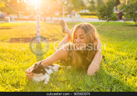 To use this stock image in your creative project, please select the size you need over to the right and click the "Add to Cart" button.
Your downloaded image will come with the Cutcaster watermark removed so don’t worry about the watermark you see on this page. young happy smiling woman with cat on natural background stock photo, young happy smiling woman with cat on natural background by Satura86