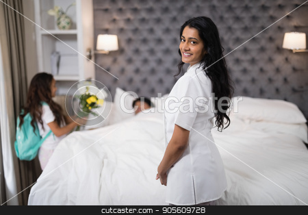 To use this stock image in your creative project, please select the size you need over to the right and click the "Add to Cart" button.
Your downloaded image will come with the Cutcaster watermark removed so don’t worry about the watermark you see on this page. Smiling nurse standing by patient on bed at home stock photo, Portrait of smiling nurse standing by patient on bed at home by Wavebreak Media