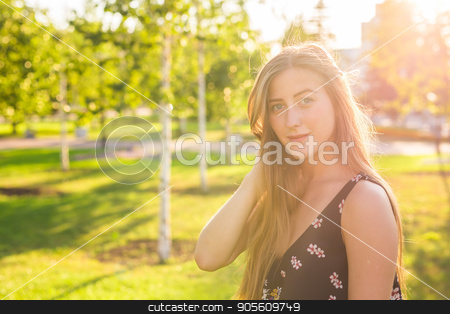 To use this stock image in your creative project, please select the size you need over to the right and click the "Add to Cart" button.
Your downloaded image will come with the Cutcaster watermark removed so don’t worry about the watermark you see on this page. Beautiful young woman in the park. Outdoor portrait stock photo, Beautiful young woman in the park. Outdoor portrait by Satura86