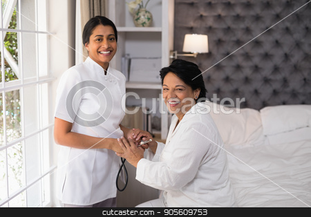 To use this stock image in your creative project, please select the size you need over to the right and click the "Add to Cart" button.
Your downloaded image will come with the Cutcaster watermark removed so don’t worry about the watermark you see on this page. Smiling nurse and female patient at home stock photo, Portrait of smiling nurse and female patient at home by Wavebreak Media