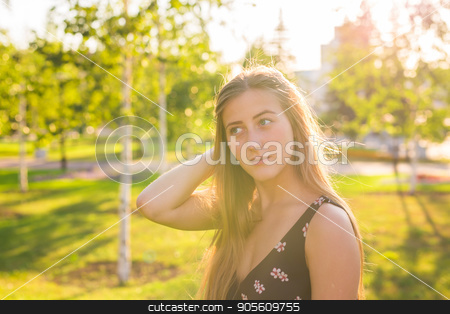 To use this stock image in your creative project, please select the size you need over to the right and click the "Add to Cart" button.
Your downloaded image will come with the Cutcaster watermark removed so don’t worry about the watermark you see on this page. Summer girl portrait. Happy woman smiling on sunny summer or spring day outside in park. Pretty Caucasian woman outdoors stock photo, Summer girl portrait. Happy woman smiling on sunny summer or spring day outside in park. Pretty Caucasian woman outdoors by Satura86