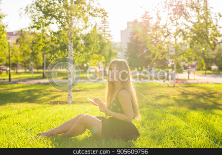 To use this stock image in your creative project, please select the size you need over to the right and click the "Add to Cart" button.
Your downloaded image will come with the Cutcaster watermark removed so don’t worry about the watermark you see on this page. Girl listening to music streaming with headphones in summer on a meadow stock photo, Girl listening to music streaming with headphones in summer on a meadow by Satura86