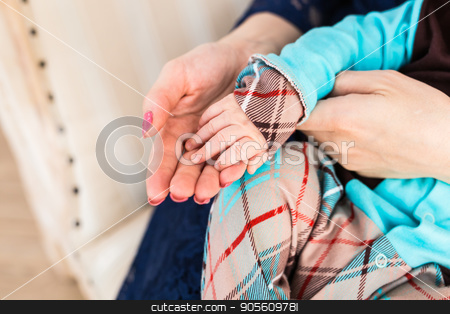 To use this stock image in your creative project, please select the size you need over to the right and click the "Add to Cart" button.
Your downloaded image will come with the Cutcaster watermark removed so don’t worry about the watermark you see on this page. Concept of love and family. hands of mother and baby closeup stock photo, Concept of love and family. hands of mother and baby closeup by Satura86