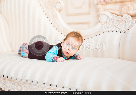 To use this stock image in your creative project, please select the size you need over to the right and click the "Add to Cart" button.
Your downloaded image will come with the Cutcaster watermark removed so don’t worry about the watermark you see on this page. bright portrait of adorable baby stock photo, bright portrait of adorable baby boy indoors by Satura86