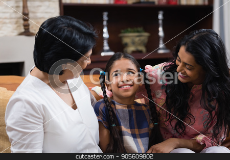 To use this stock image in your creative project, please select the size you need over to the right and click the "Add to Cart" button.
Your downloaded image will come with the Cutcaster watermark removed so don’t worry about the watermark you see on this page. Cute smiling girl with mother and grandmother sitting at home stock photo, Cute smiling girl with mother and grandmother sitting together on sofa at home by Wavebreak Media