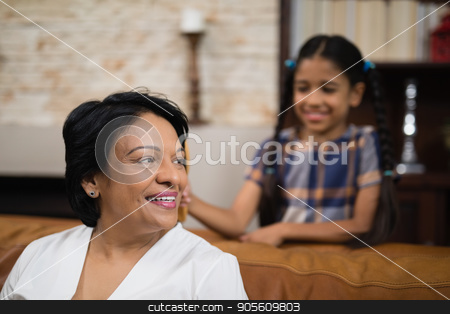 To use this stock image in your creative project, please select the size you need over to the right and click the "Add to Cart" button.
Your downloaded image will come with the Cutcaster watermark removed so don’t worry about the watermark you see on this page. Smiling mature woman sitting on sofa stock photo, Smiling mature woman sitting on sofa at home by Wavebreak Media