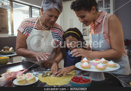 To use this stock image in your creative project, please select the size you need over to the right and click the "Add to Cart" button.
Your downloaded image will come with the Cutcaster watermark removed so don’t worry about the watermark you see on this page. Happy family preparing desserts in kitchen stock photo, Happy family preparing desserts in kitchen at home by Wavebreak Media