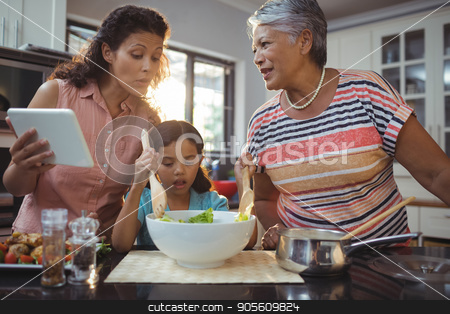 To use this stock image in your creative project, please select the size you need over to the right and click the "Add to Cart" button.
Your downloaded image will come with the Cutcaster watermark removed so don’t worry about the watermark you see on this page. Happy family preparing food in kitchen stock photo, Happy family preparing food in kitchen at home by Wavebreak Media
