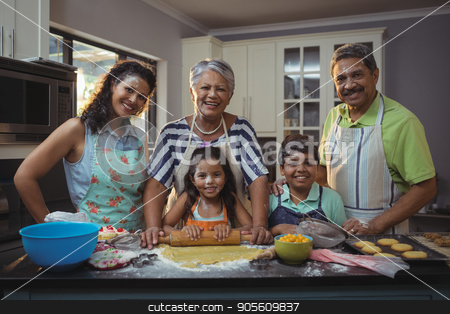 To use this stock image in your creative project, please select the size you need over to the right and click the "Add to Cart" button.
Your downloaded image will come with the Cutcaster watermark removed so don’t worry about the watermark you see on this page. Happy family preparing dessert in kitchen stock photo, Portrait of happy family preparing dessert in kitchen at home by Wavebreak Media