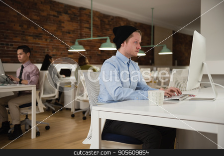 To use this stock image in your creative project, please select the size you need over to the right and click the "Add to Cart" button.
Your downloaded image will come with the Cutcaster watermark removed so don’t worry about the watermark you see on this page. Executive working on computer in office stock photo, Attentive executive working on computer in office by Wavebreak Media