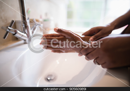 To use this stock image in your creative project, please select the size you need over to the right and click the "Add to Cart" button.
Your downloaded image will come with the Cutcaster watermark removed so don’t worry about the watermark you see on this page. Cropped hands of mother assisting girl while washing hands stock photo, Cropped hands of mother assisting girl while washing hands at bathroom sink by Wavebreak Media