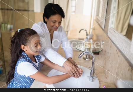 To use this stock image in your creative project, please select the size you need over to the right and click the "Add to Cart" button.
Your downloaded image will come with the Cutcaster watermark removed so don’t worry about the watermark you see on this page. Grandmother and granddaughter washing hands at bathroom sink stock photo, High angle view of grandmother and granddaughter washing hands at bathroom sink by Wavebreak Media