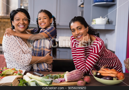 To use this stock image in your creative project, please select the size you need over to the right and click the "Add to Cart" button.
Your downloaded image will come with the Cutcaster watermark removed so don’t worry about the watermark you see on this page. Portrait of happy multi-generation family standing in kitchen stock photo, Portrait of happy multi-generation family standing in kitchen at home by Wavebreak Media