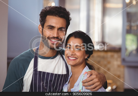 To use this stock image in your creative project, please select the size you need over to the right and click the "Add to Cart" button.
Your downloaded image will come with the Cutcaster watermark removed so don’t worry about the watermark you see on this page. Portrait of smiling couple embracing in kitchen stock photo, Portrait of smiling young couple embracing in kitchen at home by Wavebreak Media