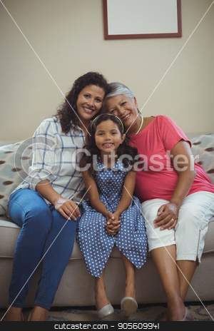 To use this stock image in your creative project, please select the size you need over to the right and click the "Add to Cart" button.
Your downloaded image will come with the Cutcaster watermark removed so don’t worry about the watermark you see on this page. Happy family sitting on sofa in living room stock photo, Portrait of happy family sitting on sofa in living room at home by Wavebreak Media