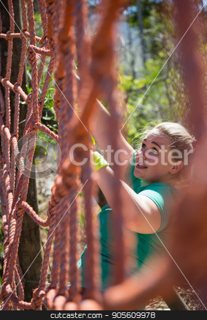 To use this stock image in your creative project, please select the size you need over to the right and click the "Add to Cart" button.
Your downloaded image will come with the Cutcaster watermark removed so don’t worry about the watermark you see on this page. Determined woman climbing a net during obstacle course training stock photo, Determined woman climbing a net during obstacle course training in the boot camp by Wavebreak Media