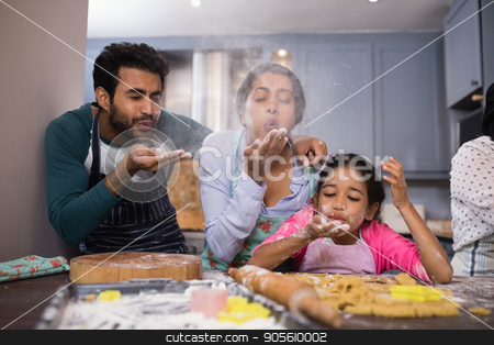 To use this stock image in your creative project, please select the size you need over to the right and click the "Add to Cart" button.
Your downloaded image will come with the Cutcaster watermark removed so don’t worry about the watermark you see on this page. Playful family blowing flour in kitchen stock photo, Playful family blowing flour in kitchen at home by Wavebreak Media