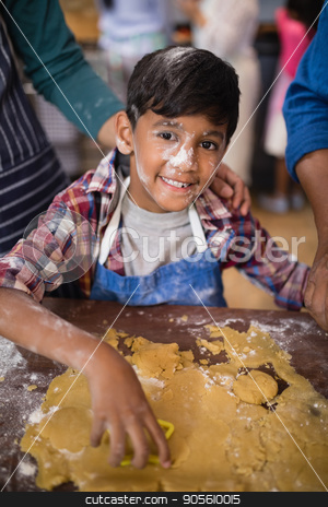 To use this stock image in your creative project, please select the size you need over to the right and click the "Add to Cart" button.
Your downloaded image will come with the Cutcaster watermark removed so don’t worry about the watermark you see on this page. Portrait of smiling boy preparing food in kitchen stock photo, Portrait of smiling boy preparing food in kitchen at home by Wavebreak Media
