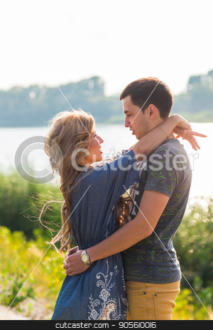 To use this stock image in your creative project, please select the size you need over to the right and click the "Add to Cart" button.
Your downloaded image will come with the Cutcaster watermark removed so don’t worry about the watermark you see on this page. Portrait of happy girl hugging her boyfriend outside stock photo, Portrait of happy girl hugging her boyfriend outside by Satura86