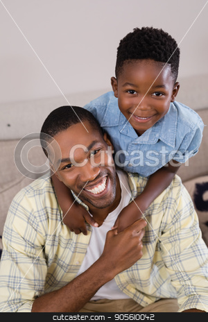 To use this stock image in your creative project, please select the size you need over to the right and click the "Add to Cart" button.
Your downloaded image will come with the Cutcaster watermark removed so don’t worry about the watermark you see on this page. Cheerful father and son in living room at home stock photo, Portrait cheerful father and son in living room at home by Wavebreak Media