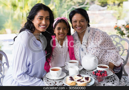 To use this stock image in your creative project, please select the size you need over to the right and click the "Add to Cart" button.
Your downloaded image will come with the Cutcaster watermark removed so don’t worry about the watermark you see on this page. Portrait of smiling multi-generation family sitting together by breakfast table stock photo, Portrait of smiling multi-generation family sitting together by breakfast table at home by Wavebreak Media
