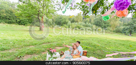 To use this stock image in your creative project, please select the size you need over to the right and click the "Add to Cart" button.
Your downloaded image will come with the Cutcaster watermark removed so don’t worry about the watermark you see on this page. Beautiful Young Couple Having Picnic in Countryside. Happy Family Outdoor. Smiling Man and Woman relaxing in Park. Relationships stock photo, Beautiful Young Couple Having Picnic in Countryside. Happy Family Outdoor. Smiling Man and Woman relaxing in Park. Relationships by Satura86