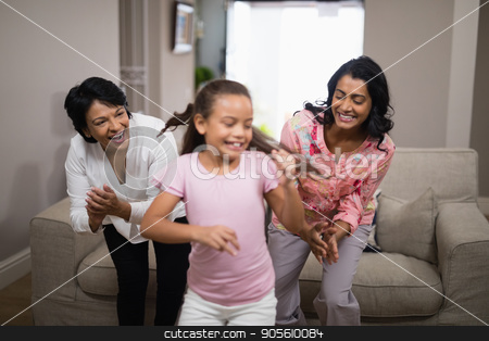 To use this stock image in your creative project, please select the size you need over to the right and click the "Add to Cart" button.
Your downloaded image will come with the Cutcaster watermark removed so don’t worry about the watermark you see on this page. Happy multi-generation family dancing together stock photo, Happy multi-generation family dancing together at home by Wavebreak Media