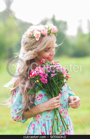 To use this stock image in your creative project, please select the size you need over to the right and click the "Add to Cart" button.
Your downloaded image will come with the Cutcaster watermark removed so don’t worry about the watermark you see on this page. outdoor portrait of a beautiful blonde woman. attractive happy girl in a field with bouquet of flowers stock photo, outdoor portrait of a beautiful blonde woman. attractive happy girl in a field with bouquet of flowers by Satura86