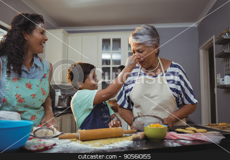 To use this stock image in your creative project, please select the size you need over to the right and click the "Add to Cart" button.
Your downloaded image will come with the Cutcaster watermark removed so don’t worry about the watermark you see on this page. Family preparing dessert in kitchen stock photo, Family preparing dessert in kitchen at home by Wavebreak Media