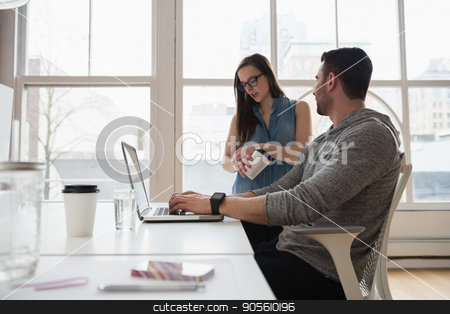 To use this stock image in your creative project, please select the size you need over to the right and click the "Add to Cart" button.
Your downloaded image will come with the Cutcaster watermark removed so don’t worry about the watermark you see on this page. Executives discussing over laptop stock photo, Executives discussing over laptop in office by Wavebreak Media