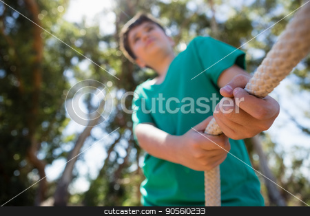 To use this stock image in your creative project, please select the size you need over to the right and click the "Add to Cart" button.
Your downloaded image will come with the Cutcaster watermark removed so don’t worry about the watermark you see on this page. Boy practicing tug of war during obstacle course training stock photo, Boy practicing tug of war during obstacle course training in the boot camp by Wavebreak Media