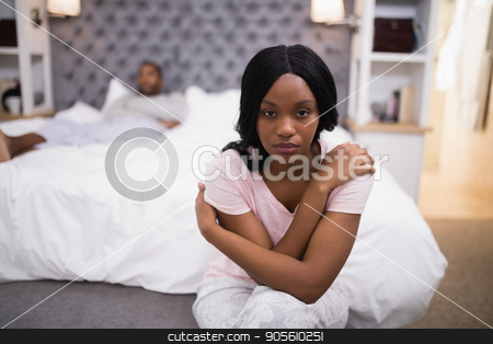 To use this stock image in your creative project, please select the size you need over to the right and click the "Add to Cart" button.
Your downloaded image will come with the Cutcaster watermark removed so don’t worry about the watermark you see on this page. Young woman sitting while man lying on bed at home stock photo, Portrait of young woman sitting while man lying on bed at home by Wavebreak Media