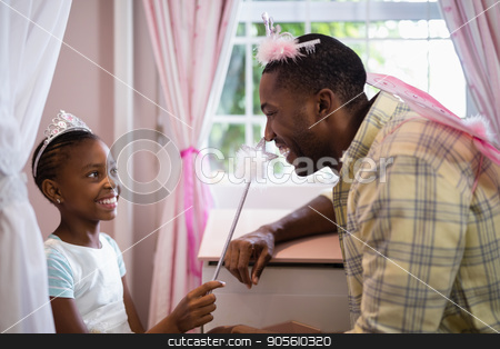 To use this stock image in your creative project, please select the size you need over to the right and click the "Add to Cart" button.
Your downloaded image will come with the Cutcaster watermark removed so don’t worry about the watermark you see on this page. Happy father and daughter wearing costume at home stock photo, Close up of happy father and daughter wearing costume at home by Wavebreak Media