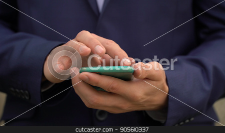 To use this stock image in your creative project, please select the size you need over to the right and click the "Add to Cart" button.
Your downloaded image will come with the Cutcaster watermark removed so don’t worry about the watermark you see on this page. Young businessman communicates in social networks on his smartphone stock photo, Young businessman communicates in social networks on his smartphone by petr zaika