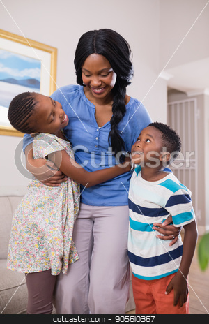 To use this stock image in your creative project, please select the size you need over to the right and click the "Add to Cart" button.
Your downloaded image will come with the Cutcaster watermark removed so don’t worry about the watermark you see on this page. Smiling mother with children in living room stock photo, Smiling mother with children in living room at home by Wavebreak Media