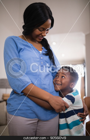 To use this stock image in your creative project, please select the size you need over to the right and click the "Add to Cart" button.
Your downloaded image will come with the Cutcaster watermark removed so don’t worry about the watermark you see on this page. Mother and son embracing at home stock photo, Smiling mother and son embracing at home by Wavebreak Media