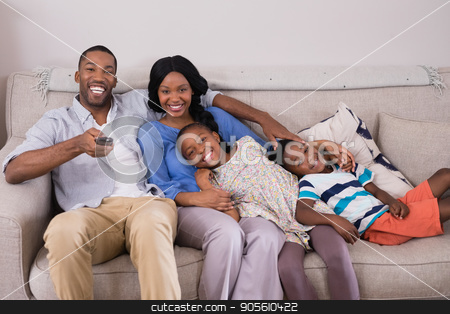 To use this stock image in your creative project, please select the size you need over to the right and click the "Add to Cart" button.
Your downloaded image will come with the Cutcaster watermark removed so don’t worry about the watermark you see on this page. Happy family enjoying television at home stock photo, Portrait of happy family enjoying television at home by Wavebreak Media