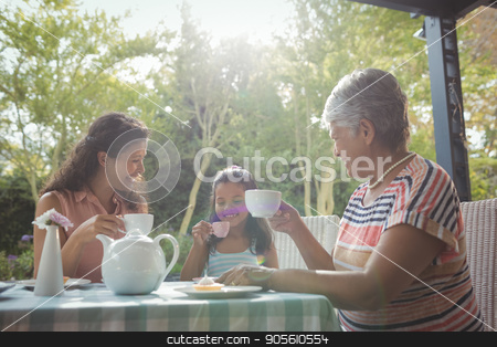To use this stock image in your creative project, please select the size you need over to the right and click the "Add to Cart" button.
Your downloaded image will come with the Cutcaster watermark removed so don’t worry about the watermark you see on this page. Happy family having tea stock photo, Happy family having tea at home by Wavebreak Media