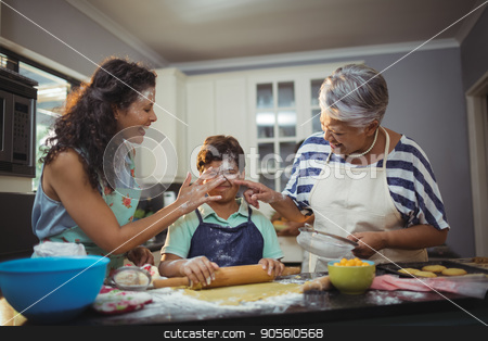 To use this stock image in your creative project, please select the size you need over to the right and click the "Add to Cart" button.
Your downloaded image will come with the Cutcaster watermark removed so don’t worry about the watermark you see on this page. Family preparing dessert in kitchen stock photo, Family preparing dessert in kitchen at home by Wavebreak Media