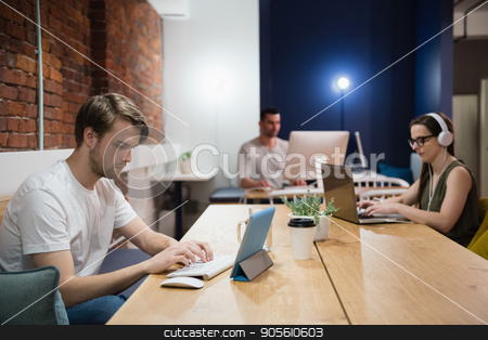 To use this stock image in your creative project, please select the size you need over to the right and click the "Add to Cart" button.
Your downloaded image will come with the Cutcaster watermark removed so don’t worry about the watermark you see on this page. Executives working at desk in office stock photo, Attentive executives working at desk in office by Wavebreak Media